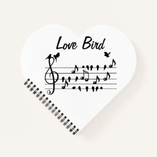 Carnet Inséparables chantant entre notes de musique