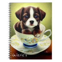 Jolie chiot dans une Tea up