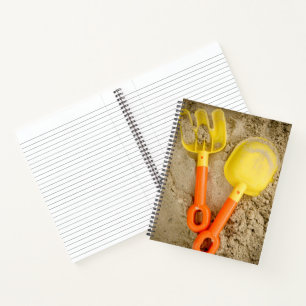 Carnet Jouets de sable jaunes et orange