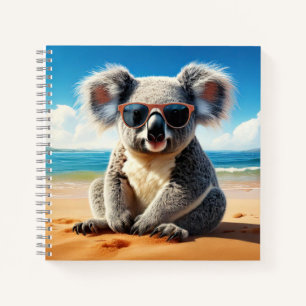 Carnet Koala sur une plage de sable