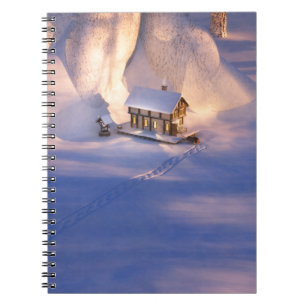 Carnet Little House dans le portable de neige