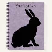 Carnet Noir assis profil côté lapin pourpre (Devant)