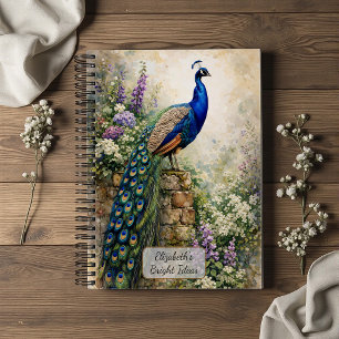 Carnet Paon dans un jardin fleuri