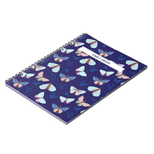 Carnet papillon à motif bleu avec accent rose (Côté gauche)