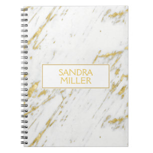 Carnet Parties scintillant d'or sur texture Marbre blanc