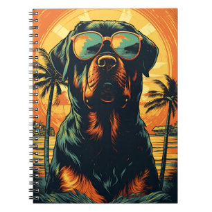 Carnet Rottweiler avec lunettes de soleil à la plage