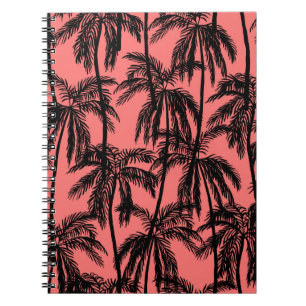 Carnet Silhouette de palmiers sur un arrière - plan rose.