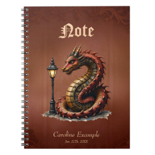 Carnet Steampunk Dragon à côté d'un lampadaire vintage.