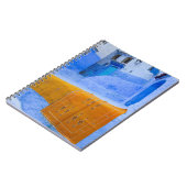 Carnet Tapis drapés sur un mur bleu (Côté gauche)