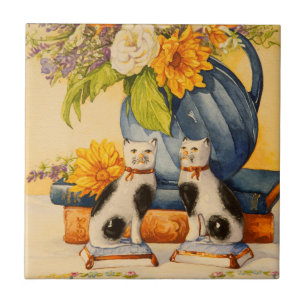 Carreau 4776 chats de porcelaine avec le broc bleu