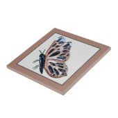 Carreau Céramique Papillon en laiton cuivre et noir sur ta (Côté)