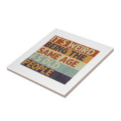 Carreau C'est bizarre d'être le même âge que les personnes (Côté)