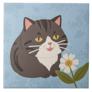 Carreau Charmant petit chat gris avec une fleur de camomil