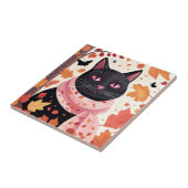 Carreau Chat noir aux yeux roses portant une écharpe (Côté)