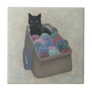 Carreau Chat noir dans un sac de laine