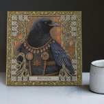 Carreau Crow Spirit Animal Nom Personnalisé Champ<br><div class="desc">Enchanted Crow Spirit Animal Bird Personnalisé Immergez-vous dans un royaume mystique avec notre Enchanted Crow Spirit Personnalisé Carrelage céramique. Une magnifique corneille, ornée de bijoux tribaux, se dresse au centre, incarnant l'harmonie symétrique et l'énergie vibrante de l'esthétique Happycore et Carpet Punk. La noblesse de la corneille, rehaussée de riches tons...</div>