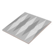 Carreau de céramique à motifs de losanges gris (Côté)