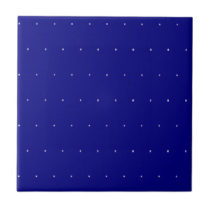 Carreau de céramique bleu et blanc à pois