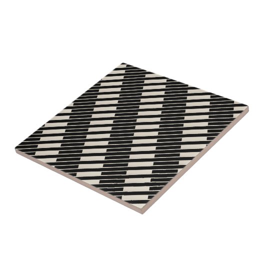 Carreau de céramique rayé noir et beige (Côté)