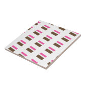 Carreau de céramique rose à rayures blanches (Côté)