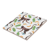 Carreau De doux singes qui jonglent avec des bananes (Côté)