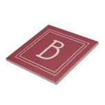 Carreau Famille Monogramme moderne Garder Rouge<br><div class="desc">Design dispose d'un monogramme moderne et élégant double encadré sur mesure en crème ajoutée à la décoration chic simple arrière - plan rouge pourpre.. Super idée cadeau ! Parfait pour le chauffage domestique. Utilisez notre simple modèle pour compléter votre design. Contactez-moi à beachpausedesigns@gmail.com si vous avez des demandes de couleur...</div>