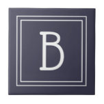 Carreau Famille Monogramme moderne Initiale Bleu & Blanc<br><div class="desc">Design dispose d'un monogramme moderne et élégant double encadré sur mesure ajouté à l'arrière - plan chic simple bleu foncé.. Super idée cadeau ! Parfait pour le chauffage domestique. Utilisez notre simple modèle pour compléter votre design. Contactez-moi à beachpausedesigns@gmail.com si vous avez des demandes de couleur personnalisées ou si vous...</div>