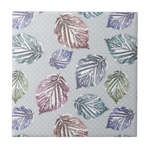 Carreau Feuilles d'open work sur un arrière - plan gris cl