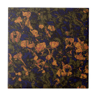Carreau Fleur orange contre le motif de camouflage de