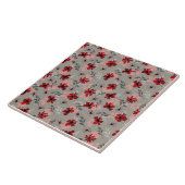 Carreau Fleurs roses rouges sur un fond gris. (Côté)
