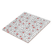 Carreau gris avec des fleurs rouges sur fond blanc rétro (Côté)