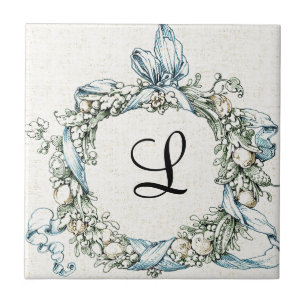 Carreau Guirlande florale décorée d'un monogramme