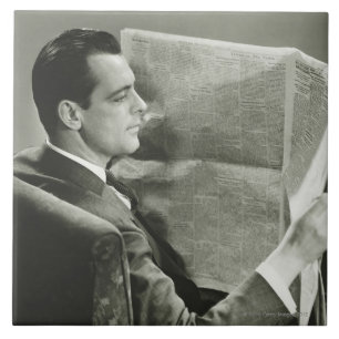 Carreau Homme d'affaires lisant le journal