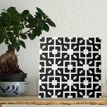 Carreau Illusion optique Motif géométrique noir et blanc<br><div class="desc">Décor moderne céramique design avec un motif en mosaïque aux formes géométriques blanches sur un arrière - plan noir. Texture avec effet d'illusion optique.</div>