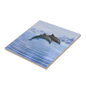 Carreau Les dauphins dans la mer bleu clair (Côté)