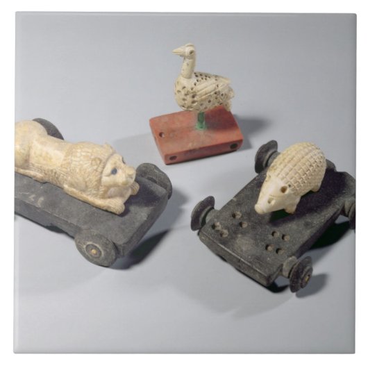 Carreau Les jouets des enfants : un hérisson, un lion et (Devant)