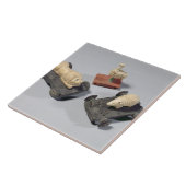 Carreau Les jouets des enfants : un hérisson, un lion et (Côté)