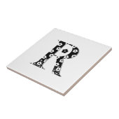 Carreau lettre à motifs floraux R (Côté)