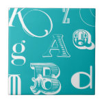 Carreau Lettres décoratives sur Arrière - plan bleu<br><div class="desc">Une véritable soupe alphabétique vous attend lorsque vous achetez cette impression de lettres décoratives sur un arrière - plan bleu. Une création Vision Studio,  ce serait un grand ajout à la salle d'un enfant ou à sa salle de jeux. Commandez une impression dès aujourd'hui !</div>