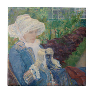 Carreau Lydia faisant du crochet dans le jardin à marneux