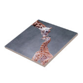 Carreau Mère des images | de Getty et girafe de bébé (Côté)