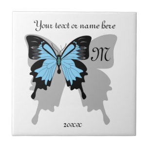 Carreau Monogramme d'ombre à papillon bleu