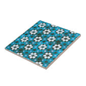Carreau Motif de turquoise et de fleur blanche (Côté)