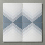 Carreau Motif moderne et audacieux, triangle<br><div class="desc">Cette tuile murale moderne présente un motif en chevron frappant composé de bandes dégradées en couches dans d'élégantes nuances de gris et de bleu. Ses lignes épurées et ses formes géométriques apportent profondeur et intérêt visuel au design. Ce carrelage est un excellent choix pour apporter une pop de personnalité sophistiquée...</div>