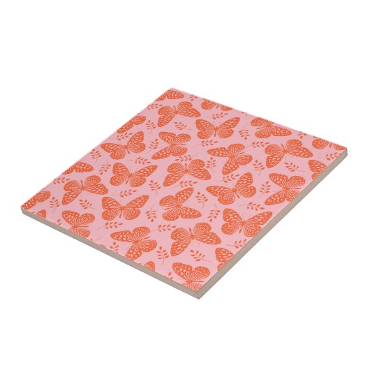 Carreau Motif papillon orange sur arrière - plan rose (Côté)