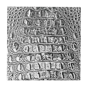 CARREAU NOIR EN CUIR ET BLANC D'ALLIGATOR DU CRU