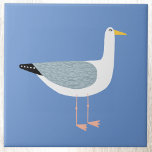 Carreau Oiseau marin bleu ciel<br><div class="desc">Une mouette coquine et amusante qui se tient au bord de l'océan. Parfait pour les amateurs de la côte. Art original de Nic Squirrell.</div>