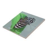 Carreau Papillon bleu ondulée sur la feuille Photo (Côté)