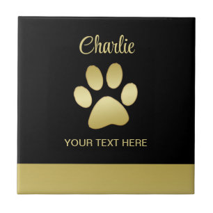 Carreau Paw chien brillant or sur arrière - plan noir