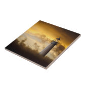 Carreau Phare rougeoyant sous le ciel dramatique (Côté)